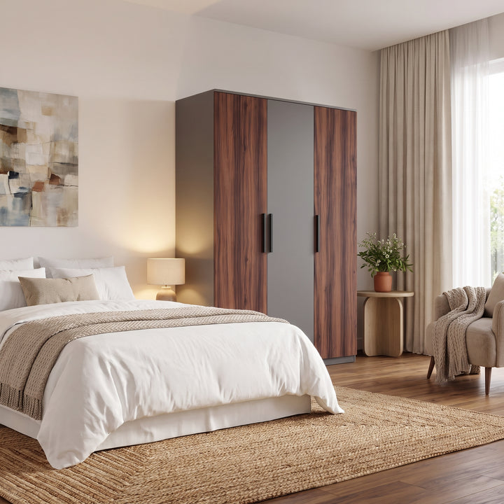 [Walnut] Bedroom lifestyle view with closed wardrobe beside a bed, warm lamp light, curtain, and side table