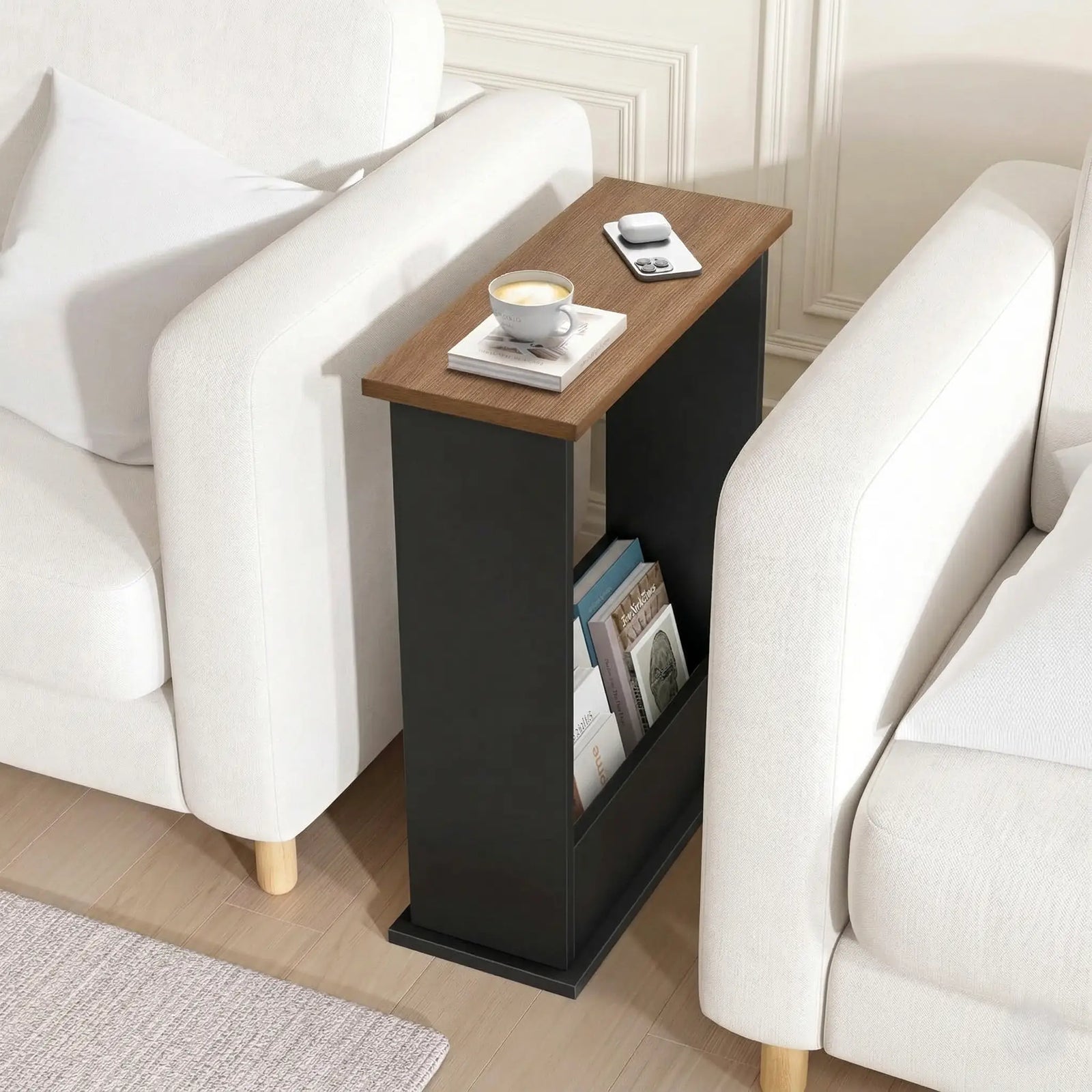 [Walnut + Black] Narrow Side Table close-up split showing cupcakes, coffee, photo frame on top and style magazines tucked into the storage rack