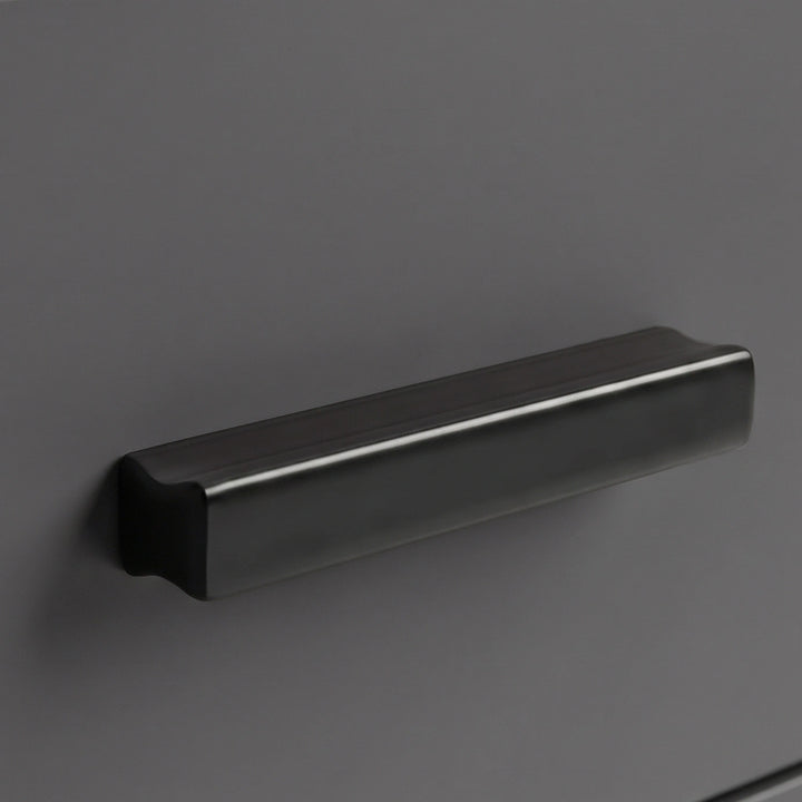 [Walnut] Close up of walnut grey drawer front with matte black wooden handle and smooth painted surface