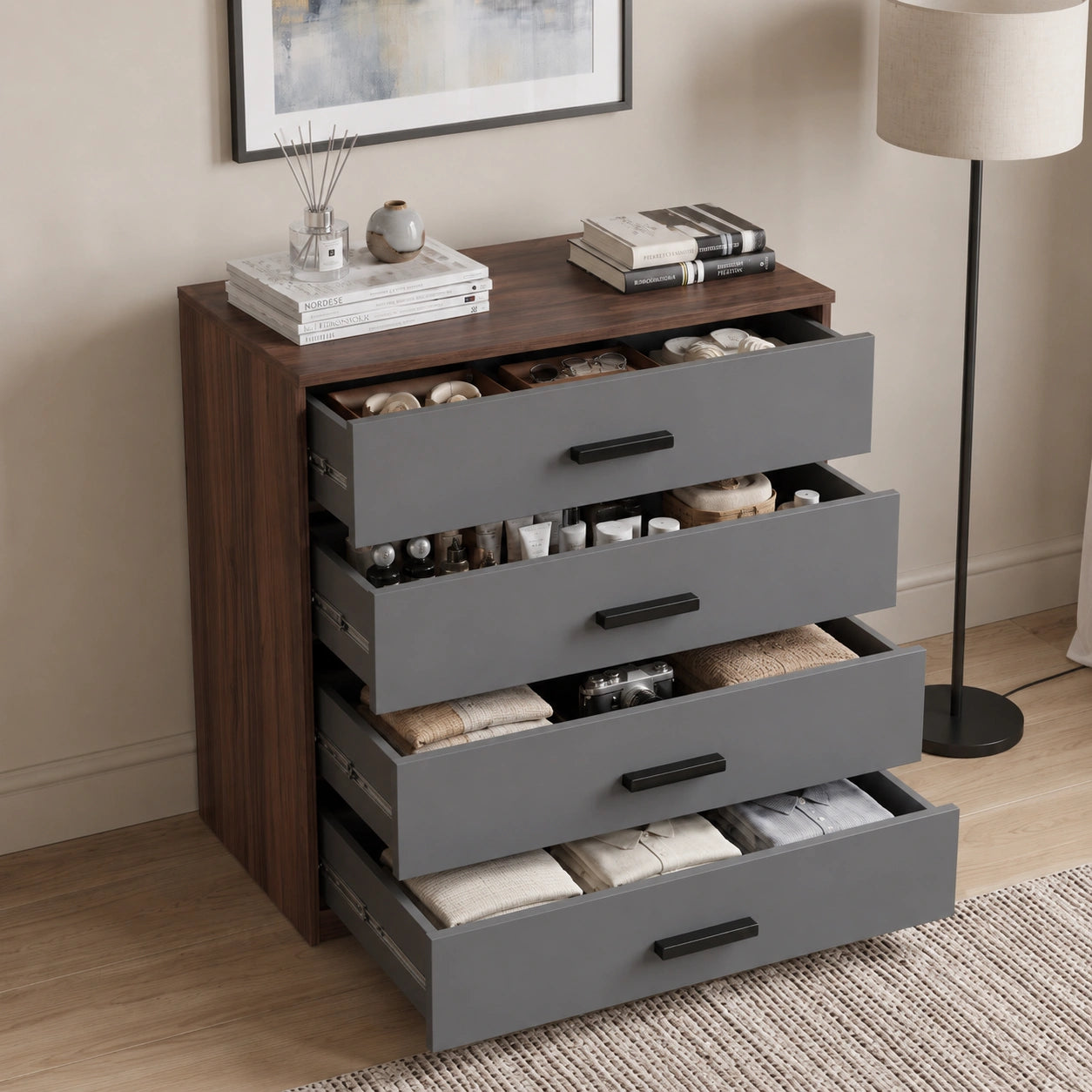[Walnut] four drawer chest shown at an angle with drawers open, revealing storage depth and layout