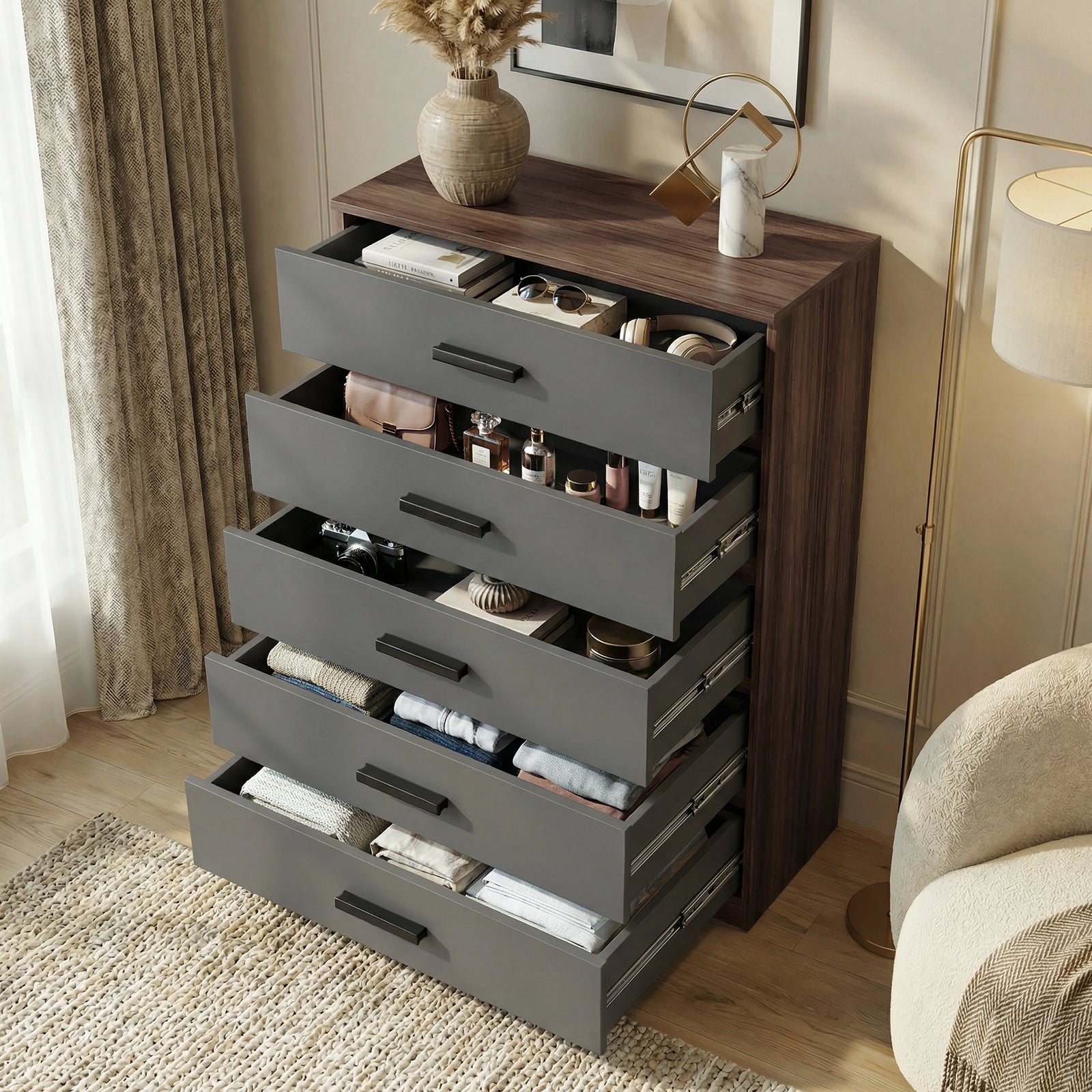 [Walnut] five drawer chest shown at an angle with drawers open, revealing storage depth and layout