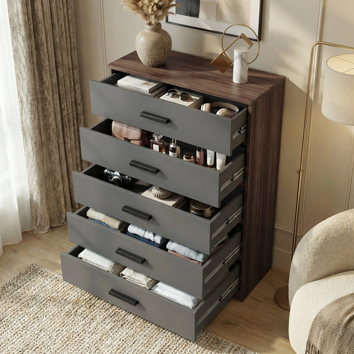 [Walnut] five drawer chest shown at an angle with drawers open, revealing storage depth and layout