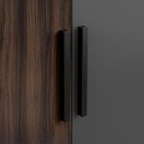 [Walnut+Grey] Close view of matte black vertical wooden handles mounted on walnut grey three door wardrobe panel