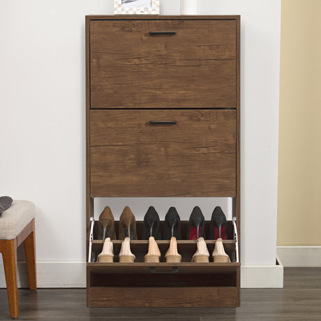 Front view of Walnut hallway shoe storage unit with the lowest drawer open, containing six pairs of footwear.