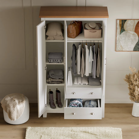 Open white wardrobe from white 3 piece bedroom set, showing shelves, drawers, hanging rail and oak-effect top