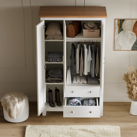 Interior view of white 3 door wardrobe from Shaker 4 Piece Bedroom Set with hanging rail, shelves, and two drawers for organized storage.