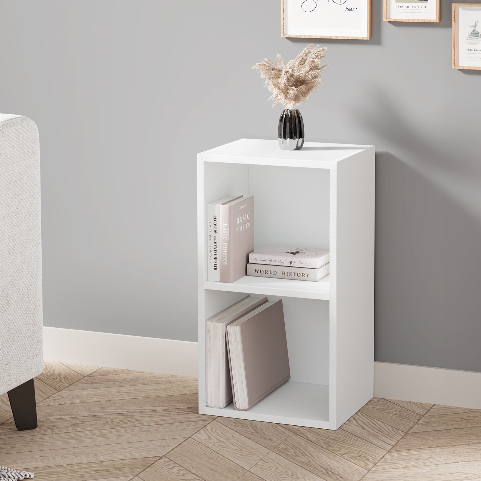 [2 Shelf | White] three-quarter shot of two-cubby low white cube bookcase with pampas in glass vase