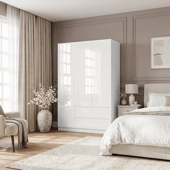 [White] High gloss 3 door wardrobe with drawers in white featuring handleless push-open doors and two bottom drawers in a modern bedroom