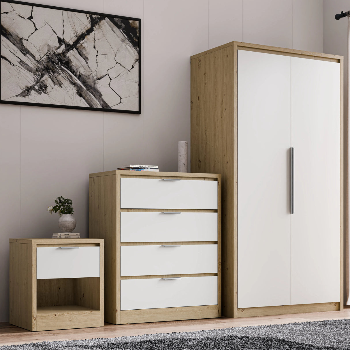 Skova 3 Piece Bedroom Set with 2-door wardrobe, 4-drawer chest, and 1-drawer bedside table in oak and white finish. Ideal for modern UK bedrooms.