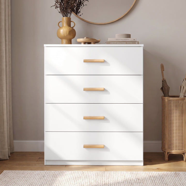 [White] Front view of a white 4-drawer chest featuring natural wood handles styled with a vase, books, and umbrella stand