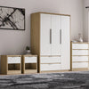 [Oak+White] Skova 4 Piece Bedroom Set featuring a white and oak wardrobe, chest of drawers, and two bedside tables in a modern UK bedroom interior.