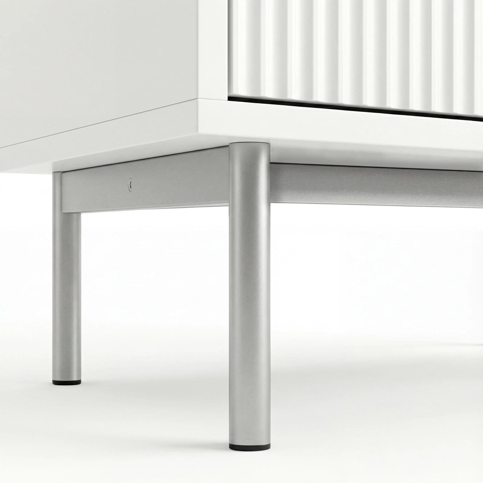 [White] 5 drawer chest, lower section showing silver metal legs and corner frame construction