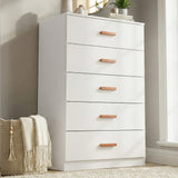 [White] five drawer chest styled in neutral interior with floor vase, wall art and wooden handles