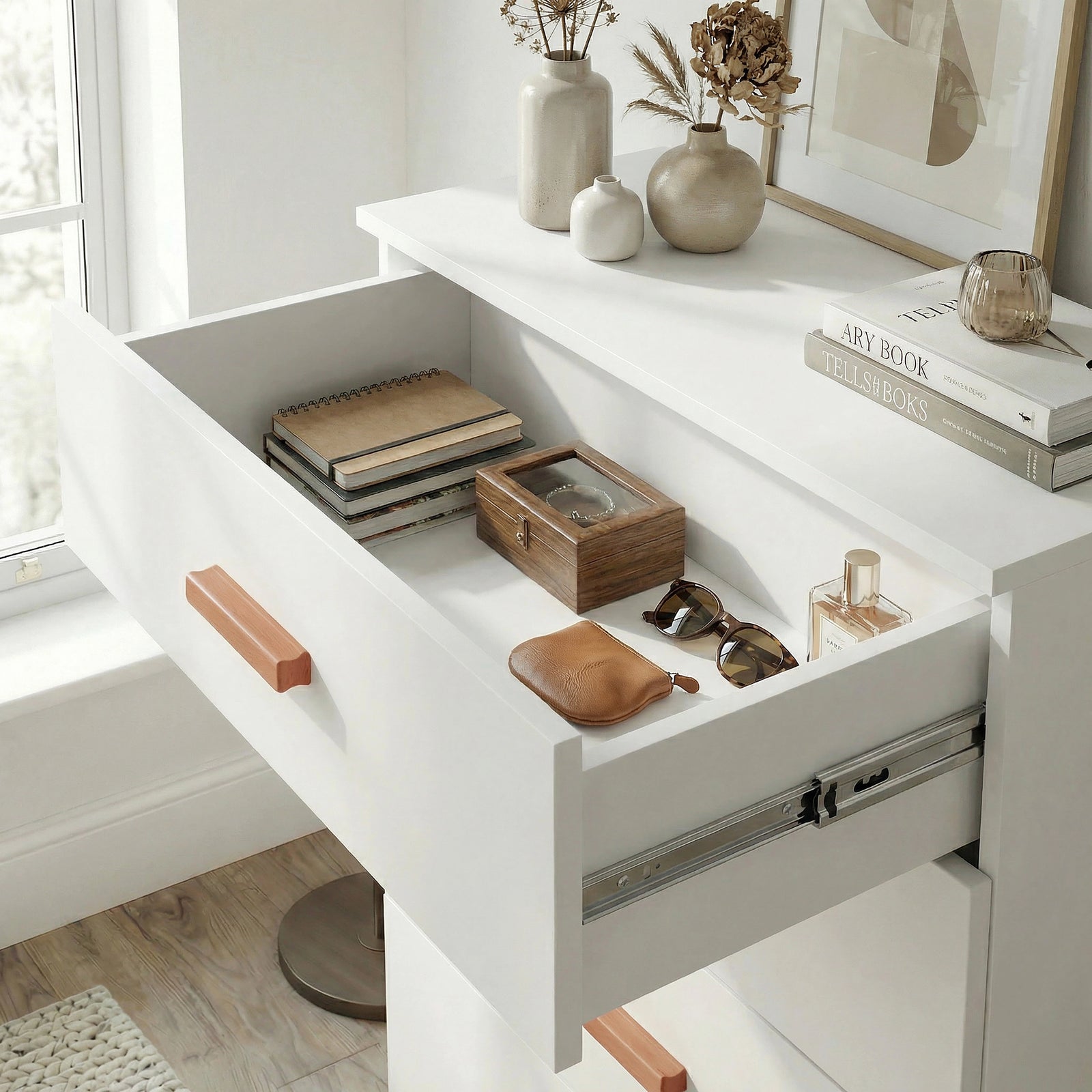 [White] Close view of white chest top drawer interior showing organised storage space and smooth inner finish