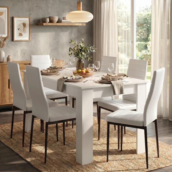 [6 Seater | White] Dining Table and Chairs Set with six white padded chairs around a white table in a bright open-plan dining room
