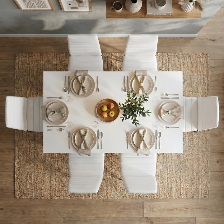 [6 Seater | White] Dining Table and Chairs Set seen from directly above with six place settings, linen napkins, glassware, fruit bowl
