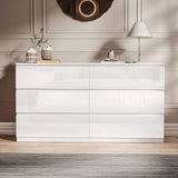 [White] High gloss 6 drawer chest front view closed in elegant bedroom with striped rug.