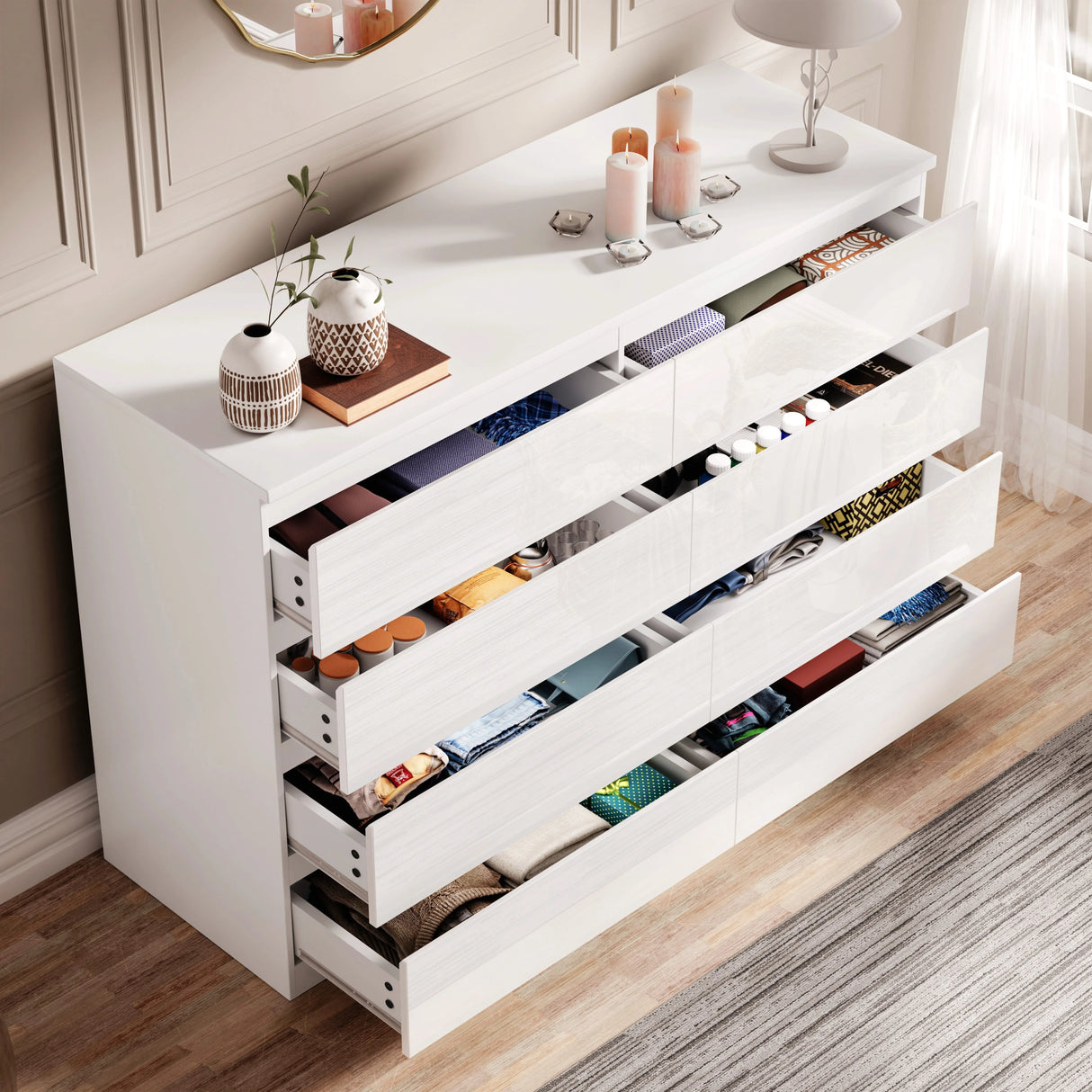 [white] high gloss 8 drawer chest with all drawers open showing folded clothes and accessories