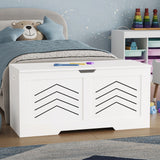 Toy Storage Box - Kids Storage Chest Blanket Box with Safety Hinges in white with arrow design, placed in a child's bedroom next to a bed and toy shelf.