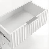 Interior view of white bedside drawer with smooth painted finish and practical storage depth