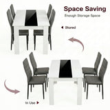 [4 Seater | Grey] White & Black Gloss 4-6 Seater Dining Table shown in stored and in-use configurations with four grey faux-leather chairs on a white background