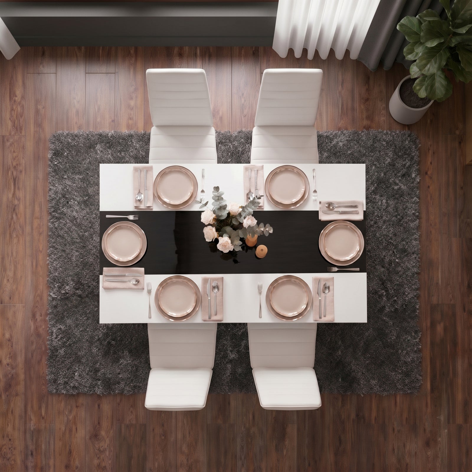 [4 Seater | White] White & Black Gloss 4-6 Seater Dining Table photographed from directly above with four white chairs and six blush place settings on a dark shag rug