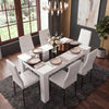 [6 Seater | White] White & Black Gloss 4-6 Seater Dining Table shown from an elevated angle with six chairs, rose-gold dinnerware, and pendant chandelier above