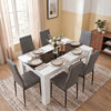 [6 Seater | Grey] White & Black Gloss 4-6 Seater Dining Table viewed from above with six grey faux-leather chairs and six neutral place settings on a woven rug
