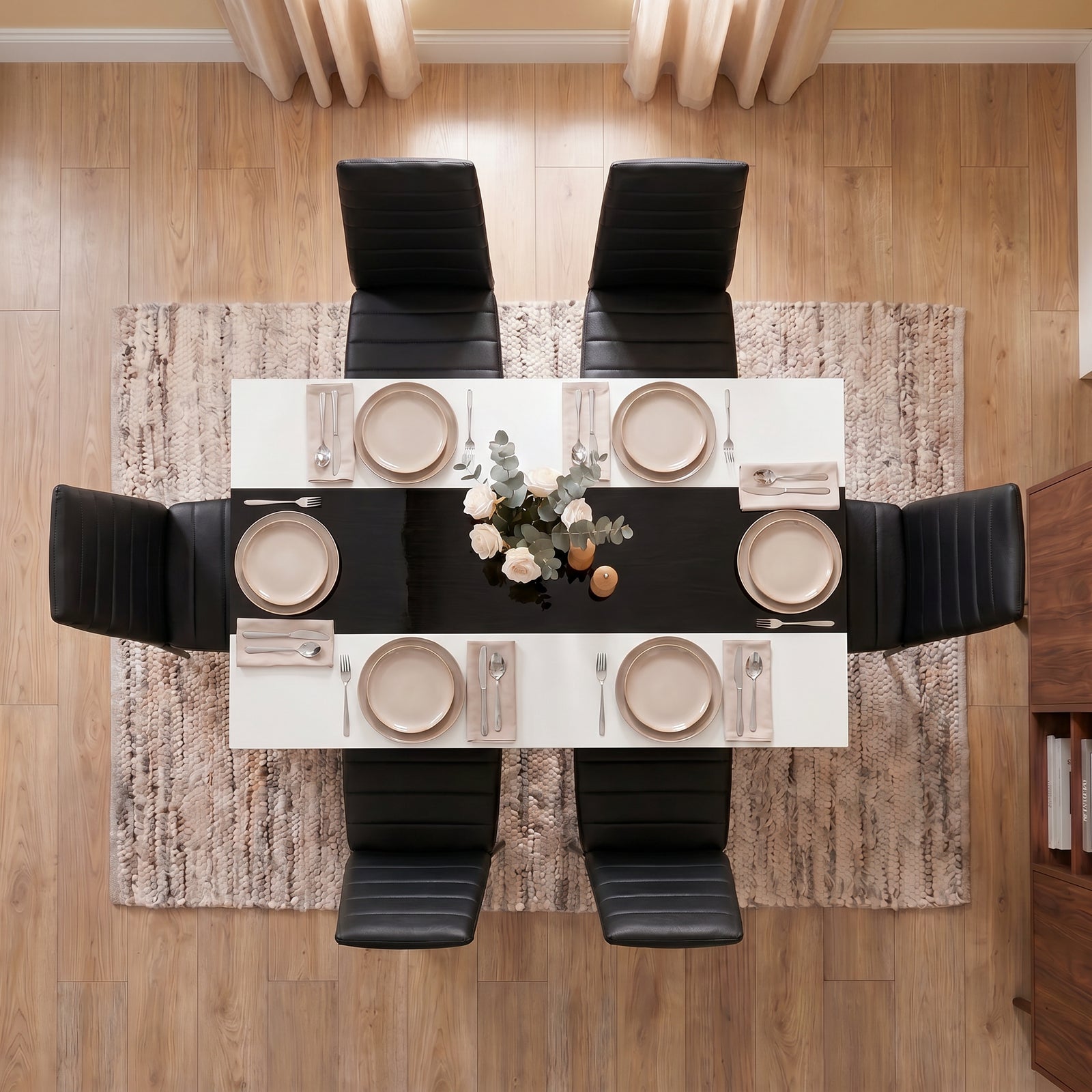 [6 Seater | Black] White & Black Gloss 4-6 Seater Dining Table seen from directly above with six black chairs and six beige place settings around a floral centrepiece