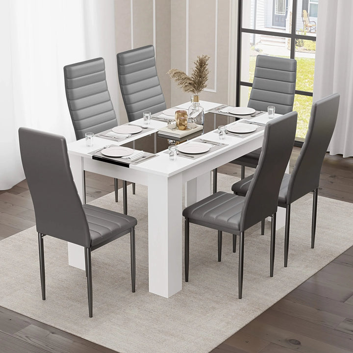 [6 Seater | Grey] lifestyle scene of six grey PU dining chairs around the white gloss 140cm dining set with black inlay