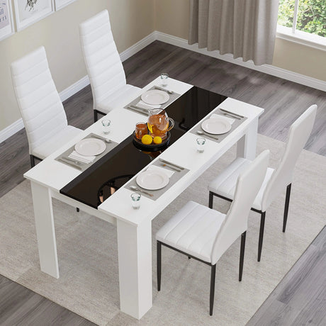 [4 Seater | White] angled top-down view of four white PU chairs around the 4 seater white gloss dining set with plates