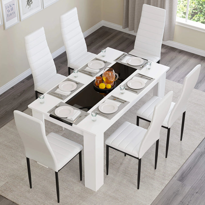 [6 Seater | White] tilted-overhead shot of the dining set: white gloss table, black inlay, six white ribbed chairs