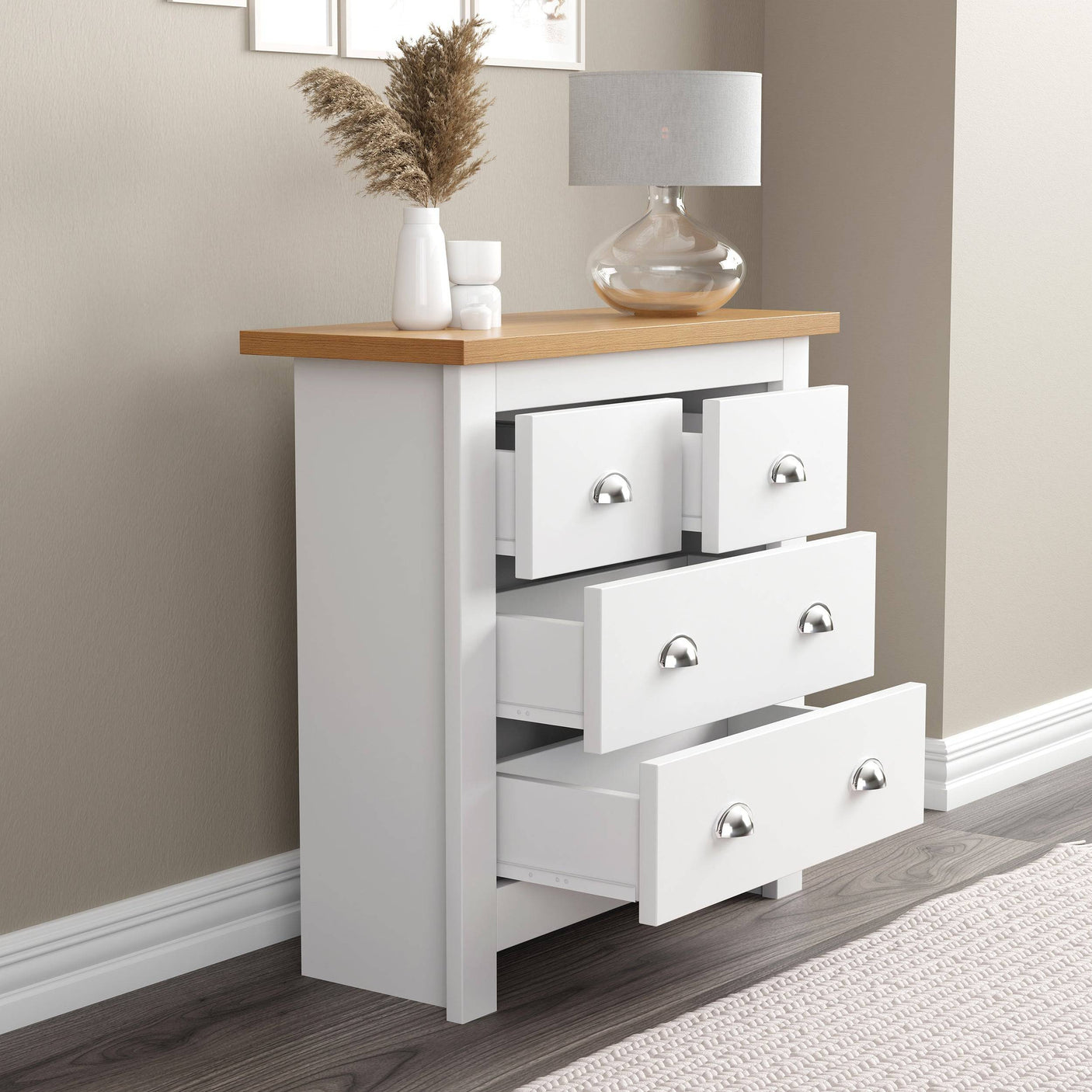 White chest of drawers for sale with open drawers and flower pot on top stylish storage.