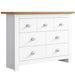 White chest of drawers with oak top and handles, blending modern design with practical storage.