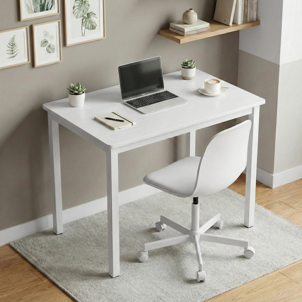 [White Desk] Computer table with laptop on top and chair placed on rug against grey wall