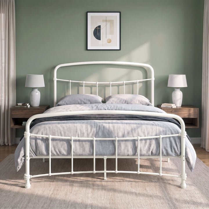 [White | Double] Front view of a white metal bed frame with curved rails and white bedding in a bright bedroom.