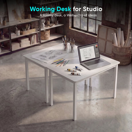 [80 x 50 cm] Home Office Desk 80cm in dark industrial studio setting with sketch drawings, coloured pencils, paint tubes, and laptop spread across the surface