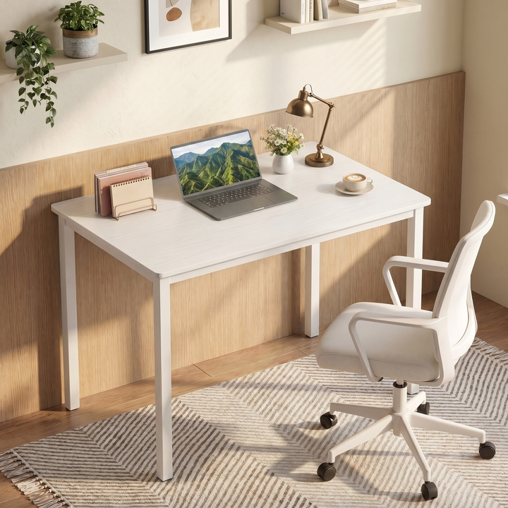 [80 x 50 cm] Home Office Desk angled in warm home office corner with wood-panelled wall, laptop, brass lamp, daisy posy, coffee cup, and white office chair on patterned rug