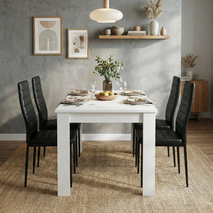 [4 Seater | Black] Dining Table and Chairs Set with four black padded chairs around a white rectangular table in a styled dining room