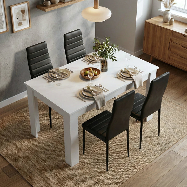 [4 Seater | Black] Dining Table and Chairs Set viewed from above in a styled dining room with place settings, glassware, and a fruit bowl centrepiece