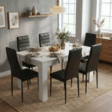 [6 Seater | Black] Dining Table and Chairs Set viewed from above in a styled dining room with six black chairs, place settings, and a fruit bowl centrepiece