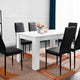 White dining table and 6 chairs set, perfect for a modern dining room.