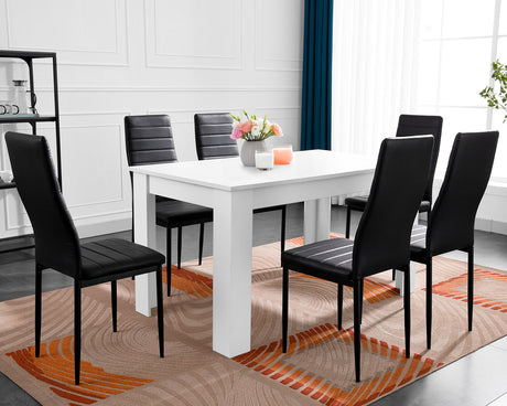 White dining table and 6 chairs set, perfect for a modern dining room.