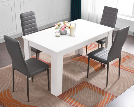 White dining table with grey chairs, a sleek and modern set for stylish dining.