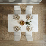 [4 Seater | White] White 4-6 Seater Dining Table and Chairs Set aerial overhead look at a minimalist four-person dinner arrangement with white plates, cloth napkins, and center
