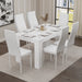 A white dining table and six chairs set in a neutral-toned room — a refined setting for modern family meals and gatherings.