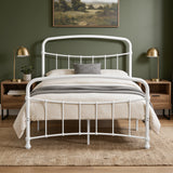 [White | Double] Front view showing curved headboard and footboard, cushion, knitted throw, wooden tables, and lamps.