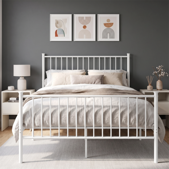 [White | Double] White metal bed with grey-white bedding, tall bar headboard, matching footboard and centre support legs.