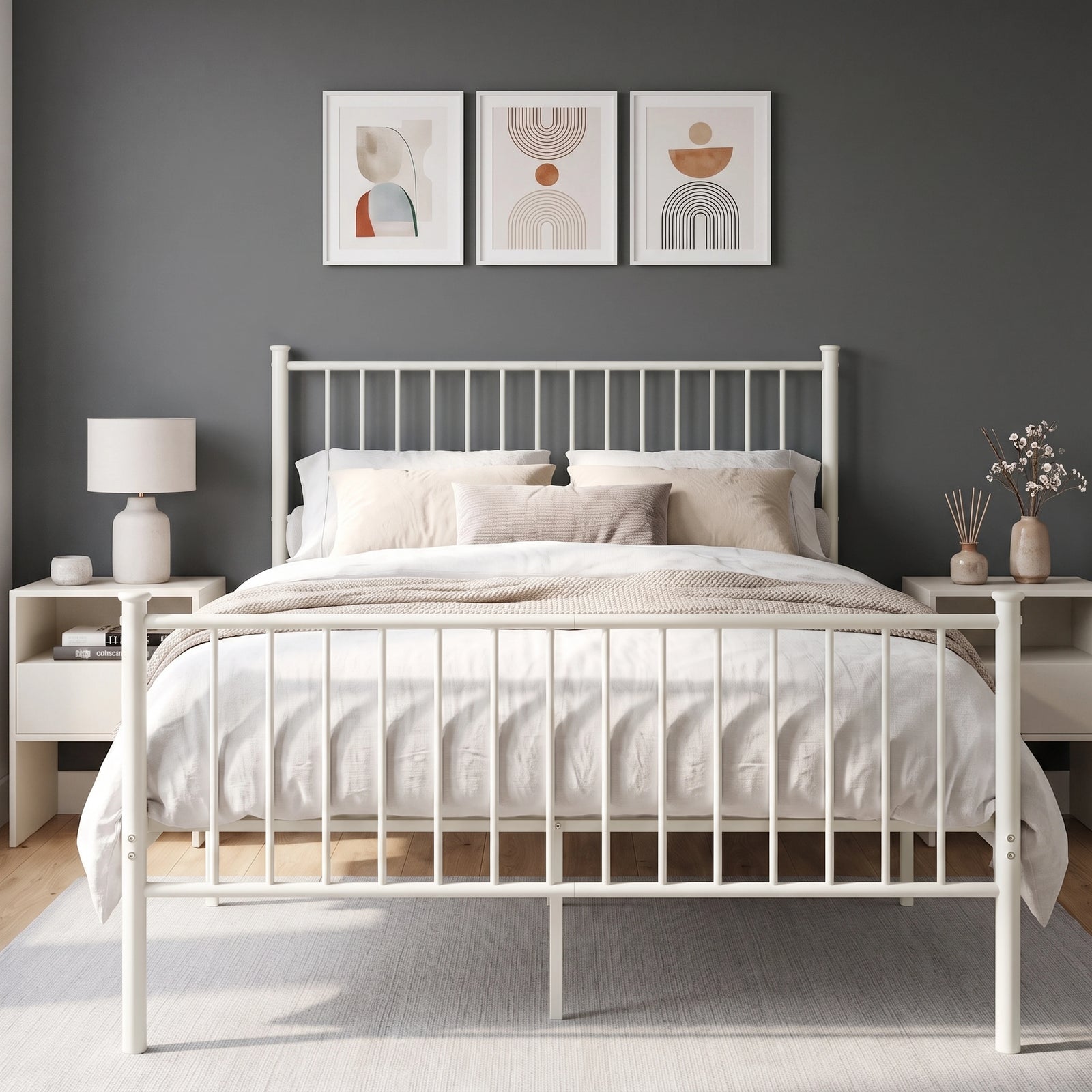 [White | Double] Front view of white metal bed with tall bar headboard, matching footboard, neutral bedding and centre leg.