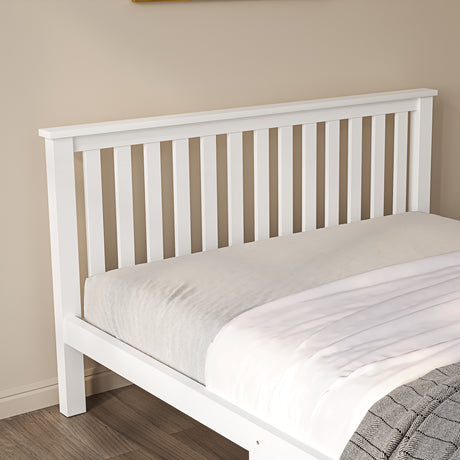 White double wooden bed frame, designed for a classic and sturdy addition to your bedroom.